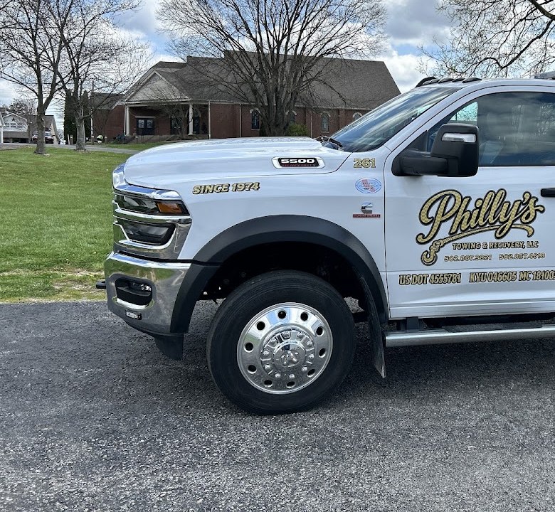 Philly's Towing truck cab and logo
